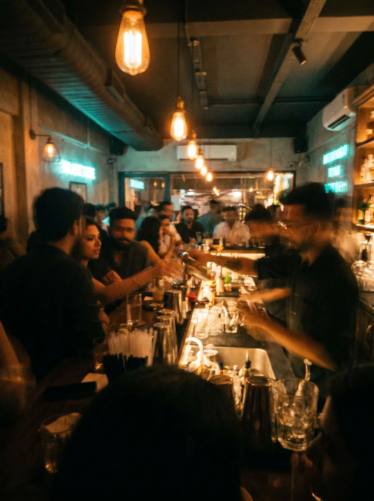 Motion-blurred crowd in a bar